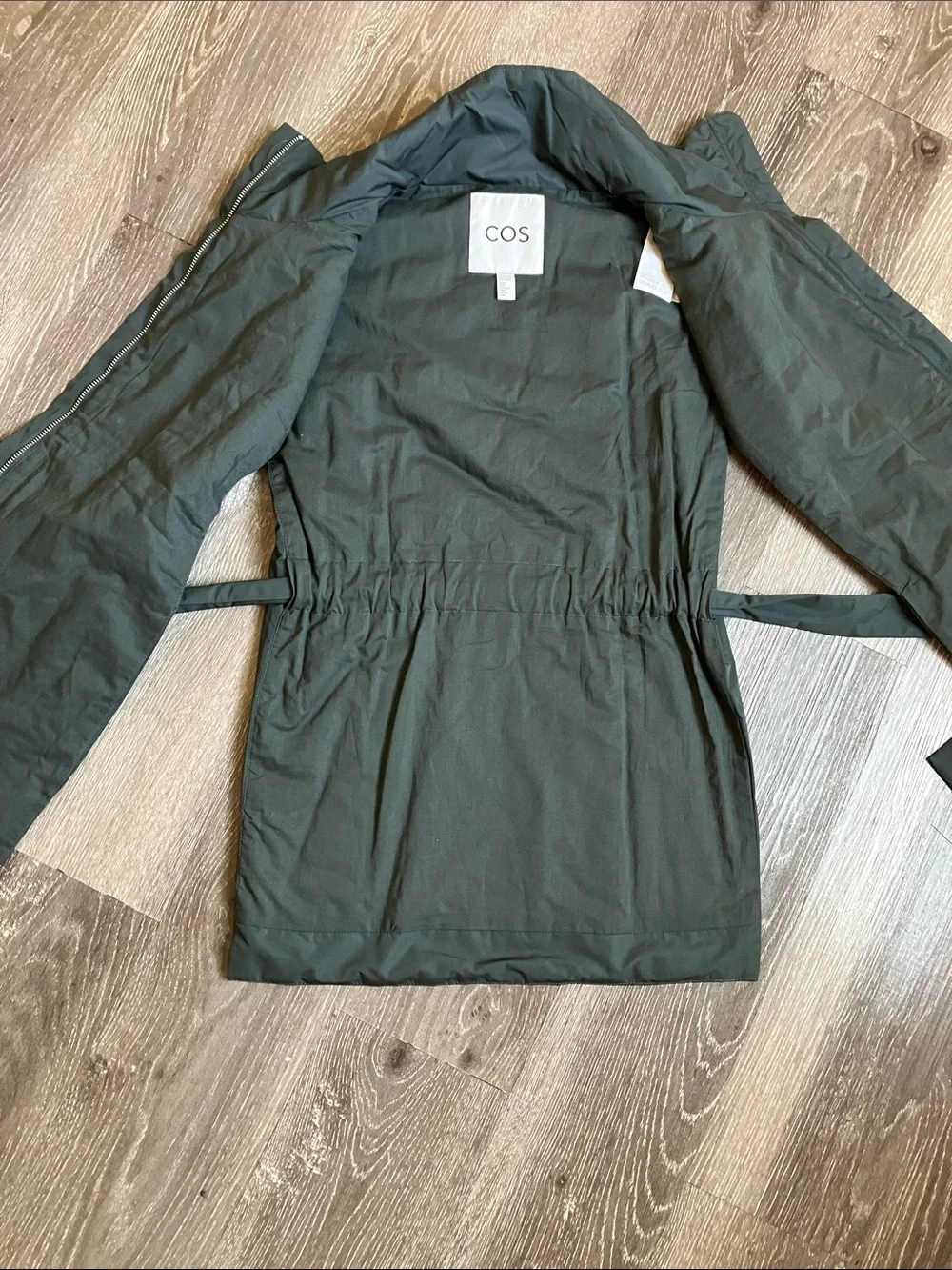dark green COS high-neck padded vest